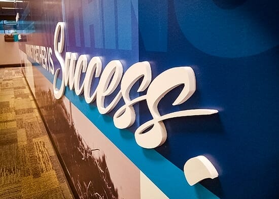 Success dimensional signage for War Malcomb