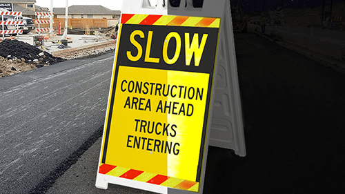 Yellow construction zone sandwich sign