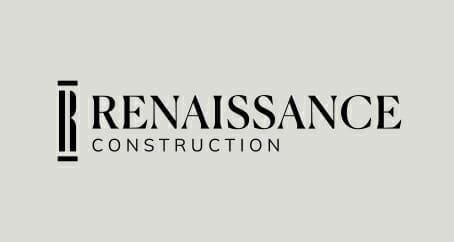 Renaissance Construction Logo on a business card.