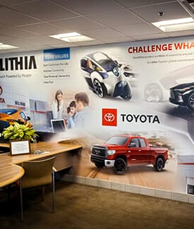Wall mural depicting a Toyota pickup truck and other Toyota vehicles.