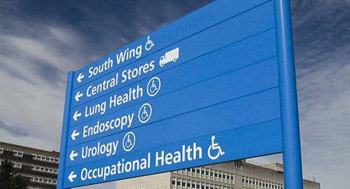 Directional outdoor traffic signage for a major hospital.