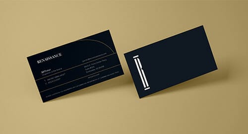 Business card mockup for a construction company showing the front and back of the card.