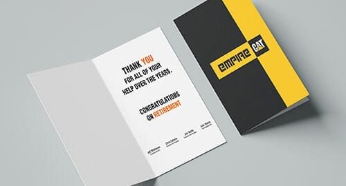 Folded congratulations card for a retirement at Empire Cat company.