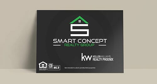 Postcard for a real estate company displayed on a grey background.